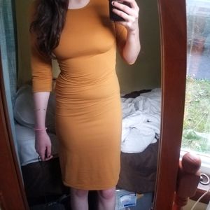 NWOT yellow long sleeve body con dress